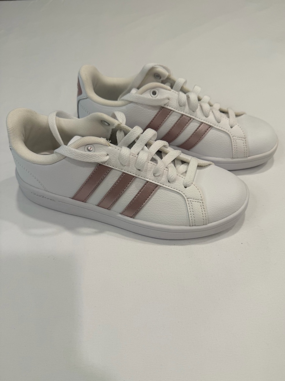 Adidas Women’s White Sneakers with Rose Gold Stripe Accents